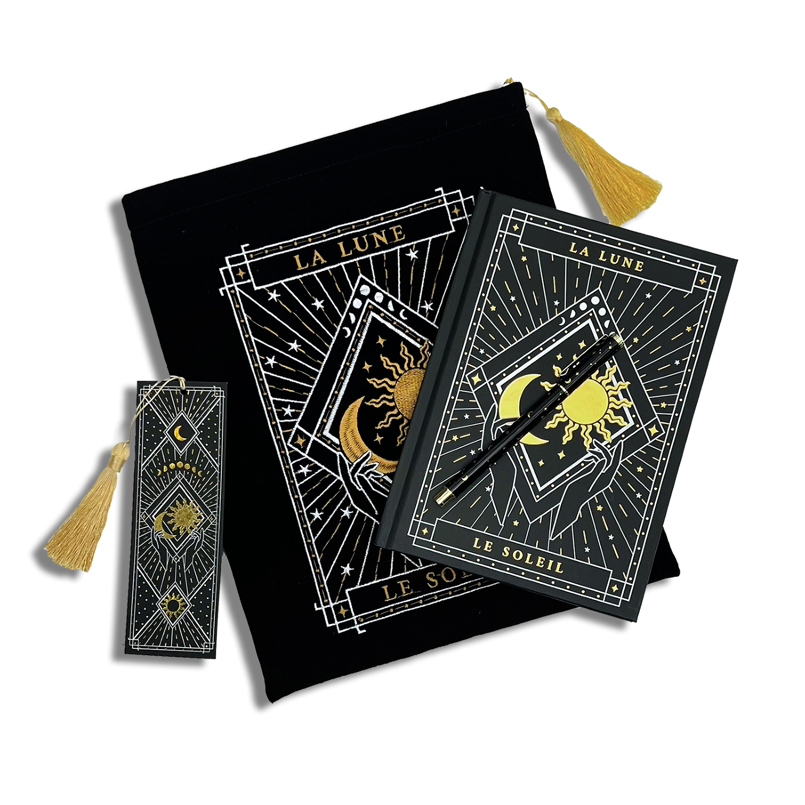 bundle of black stationery items on a plain background. Items are a book sleeve, journal, pen and bookmark. Design features a moon and sun caressed by hands with celestial inspired design. 
