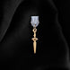 A dust plug design by The Quirky Cup Collective sits on a black fabric background. The gold sword design (as part of the romantasy e-reader decor release) shows a small gold dagger with black detailing.