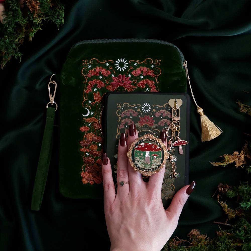 Kindle accessories bundle with green embroidered eReader sleeve, decorative sticker insert, charmlet and MagSafe grip