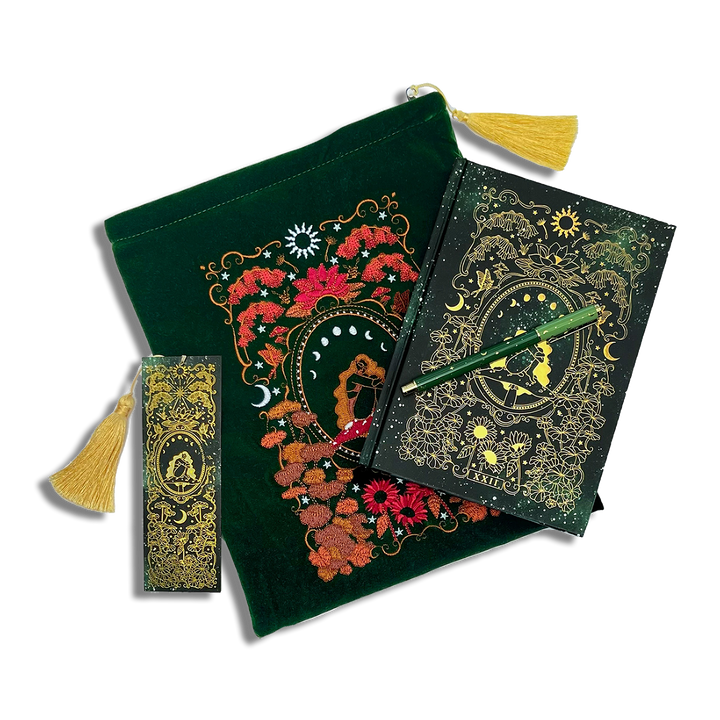 bundle of green stationery items on a plain background. Items are a book sleeve, journal, pen and bookmark. Design features a girl sitting on a mushroom surrounded by an ornate frame and botanicals decorations. 