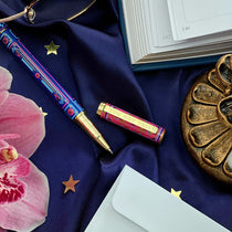You got this gel pen- black ink- reading journal pen - blue and pink - the quirky cup collective